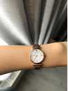 Customer picture of Emporio Armani Dames | parelmoer wijzerplaat | rosé gouden roestvrijstalen armband AR11316